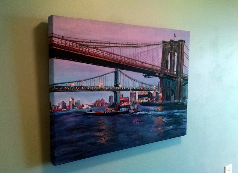 May include: A painting of the Brooklyn Bridge in New York City at dusk. The bridge is lit up with lights and there are boats in the water below. The sky is a soft purple and pink.