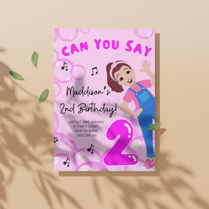 May include: Pink birthday invitation with a cartoon girl holding a large pink number 2. The invitation says "Can you say" and "Maddison's 2nd Birthday!" with details for the party.