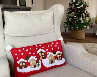 Kerstkussensloop met punchnaald: linnen vakantiestadontwerp