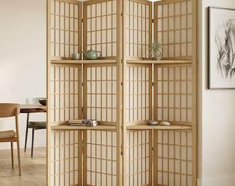 May include: A light-colored wooden room divider with a grid pattern and shelves. The divider has four panels and is placed in a room with a wooden floor. Decorative items, including a teapot and small plants, are displayed on the shelves.