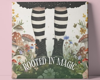 May include: A whimsical illustration of a pair of black and white striped legs wearing black boots, standing in a field of green foliage, mushrooms, and flowers. The text "ROOTED IN MAGIC" is written in a stylized font below the boots.