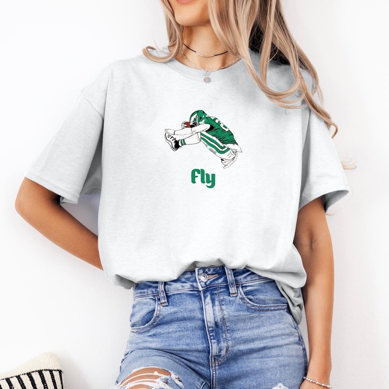 fly eagles fly shirt, philly football tee, green fan shirt, football game day top, eagles fan gift, bold football shirt, fly football player shirt, tailgate party tee, cool philly shirt, american football top, sporty fan gift, holiday football gift, unique eagles shirt, fun game day shirt, trendy football fan top, bold philly shirt, football spirit tee, casual football top, green white fan shirt, weekend football outfit