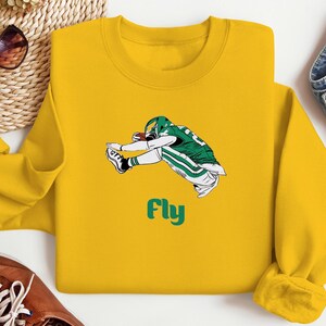 fly eagles fly shirt, philly football tee, green fan shirt, football game day top, eagles fan gift, bold football shirt, fly football player shirt, tailgate party tee, cool philly shirt, american football top, sporty fan gift, holiday football gift, unique eagles shirt, fun game day shirt, trendy football fan top, bold philly shirt, football spirit tee, casual football top, green white fan shirt, weekend football outfit