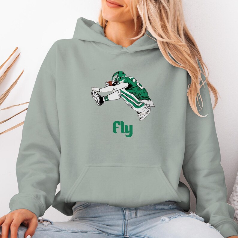 fly eagles fly shirt, philly football tee, green fan shirt, football game day top, eagles fan gift, bold football shirt, fly football player shirt, tailgate party tee, cool philly shirt, american football top, sporty fan gift, holiday football gift, unique eagles shirt, fun game day shirt, trendy football fan top, bold philly shirt, football spirit tee, casual football top, green white fan shirt, weekend football outfit