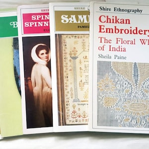 May include: A selection of vintage books with various covers. Titles include "Patchwork", "Spinning", and "Chikan Embroidery". The "Chikan Embroidery" book features a floral design and the author's name, Sheila Paine.