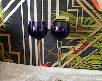 A Pair of Purple Shot Glasses with Tall Clear Stems