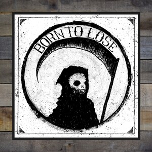 May include: Black and white illustration of a grim reaper with a scythe, inside a circle with the text "Born to Lose".