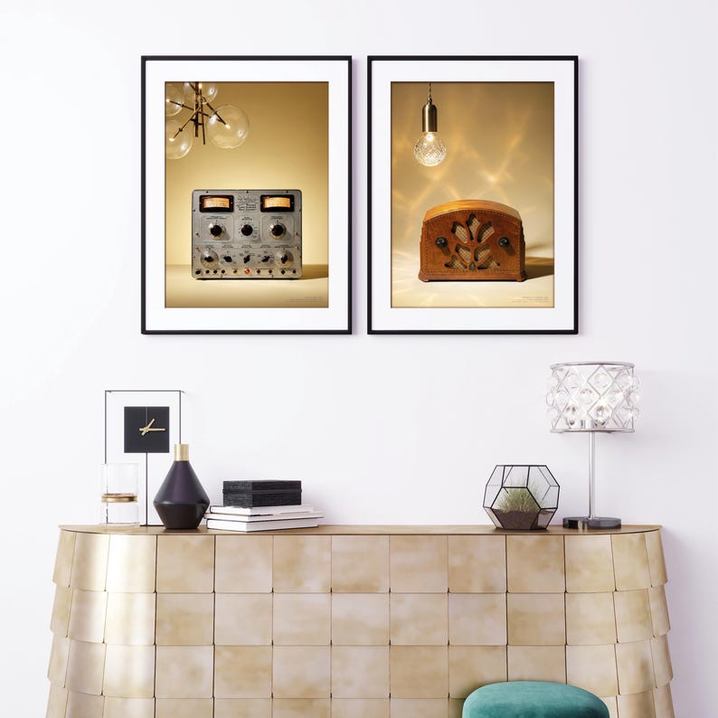 May include: Two framed vintage-style prints. One features a silver audio control panel with knobs and dials. The other showcases a wooden antique radio with a decorative front. Both are set against a warm, neutral background.