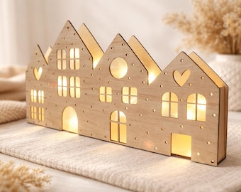 Ciudad de luces de madera, pueblo navideño, faros, hilera de casas, decoraciones de madera