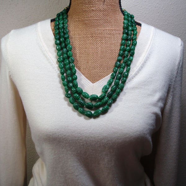 1027.00 Carats of Rich Green Carved Zambian Emerald Gemstones 3 Strand Necklace