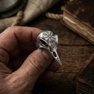 May include: A rustic wooden sign with the text "Welcome to our home" in a handwritten style. The sign is rectangular, with a distressed finish, and features a simple, inviting design. It's suitable for indoor or outdoor use.