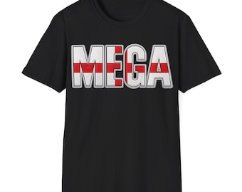 May include: Black t-shirt with the word "MEGA" in white, red, and gray block letters. The red stripes within the letters create a bold design. The shirt has a crew neck and short sleeves.