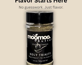 May include: A clear spice jar with a black lid, labeled "moomoo & Butter Culinary Creations." The label reads "HOLY TRINITY" and "Demi Coquus" with a net weight of 4.5 oz. The text "Flavor Starts Here" and "No guesswork. Just flavor" are at the top.