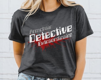 Armchair Detective T-Shirt – Gothic True-Crime Tee w/ Blood Splatter Graphic, Couch Sleuth Top, Mystery Podcast Gift, Dark Aesthetic 2025
