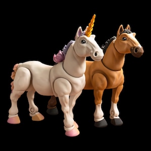 May include: Two toy horses stand side-by-side against a black background. One is a white unicorn with a golden horn and a multi-colored mane and tail. The other is a brown horse with a black mane. Both have articulated joints and are made of a matte material.