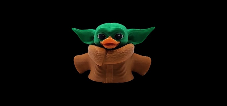 Grogu Duck Figure Star Wars Collectible Character Miniature Toy 3D Printed PLA Material Small Size Display Item Desk Accessory Green Head Large Ears Brown Robe Cute Mandalorian Character Decoration Fan Collection Unique Gift Idea Office