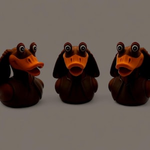 May include: Three brown rubber duck toys with orange beaks and large, expressive eyes. The ducks have a dachshund dog design, with floppy ears and a rounded body. The ducks are arranged in a row.