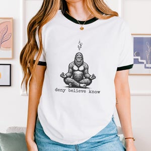 Zen Squatch Ringer T Shirt, Unisex Cotton Ringer T-Shirt, meditating bigfoot, yoga sasquatch tee, deny believe know t shirt, unique gift