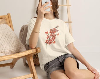Rot-oranges T-Shirt mit Blumenzweig-Grafik
