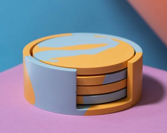 Set di 4 sottobicchieri blu pallido e giallo con supporto