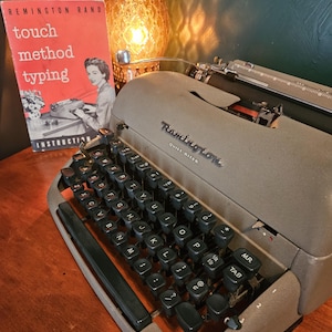 Vintage 1953 Remington Quiet-Riter Typewriter with Original Instructions Manual
