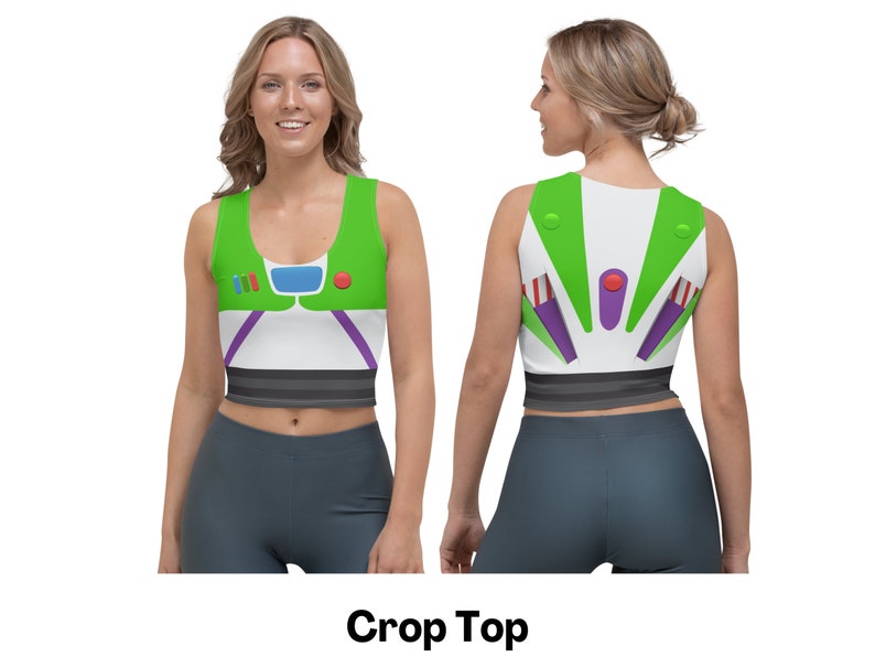 May include: A green, white, and purple crop top with a cartoon image of Buzz Lightyear from the Toy Story movie franchise. The crop top has a black waistband.