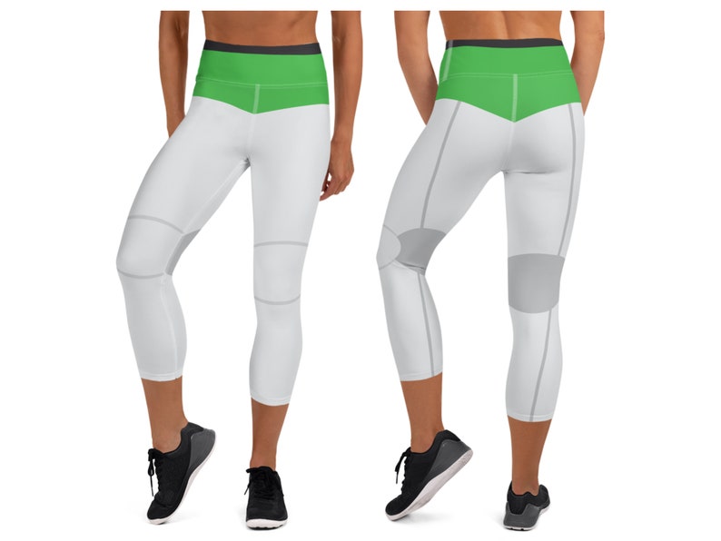 May include: White and green capri leggings with gray knee pads. The leggings have a high waist and a wide waistband.