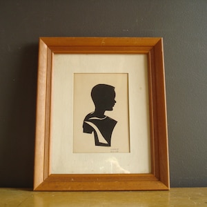 Framed Silhouette - Vintage Right Facing Silhouette of Young Boy - Papercut Rock City Souvenir Portrait