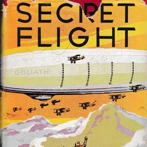 May include: A vintage book cover illustration featuring a large blimp labeled "Goliath" flying over a snowy mountain range. The book title is "SECRET FLIGHT" and the author is "EDWIN GREEN".