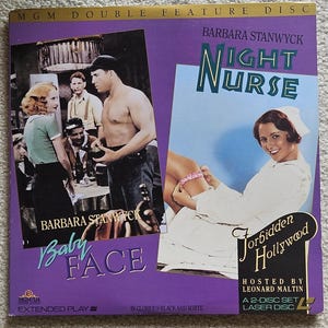 May include: A rustic wooden sign with the text "Welcome to our home" in white lettering. The sign features a distressed finish and a simple, inviting design, perfect for front door decor.