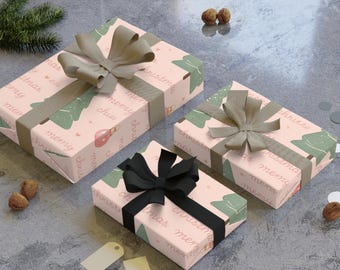 May include: Three wrapped Christmas presents with bows. The gifts are wrapped in pink paper with a repeating pattern of green Christmas trees, baubles, and the words "Merry Christmas". The bows are taupe and black.