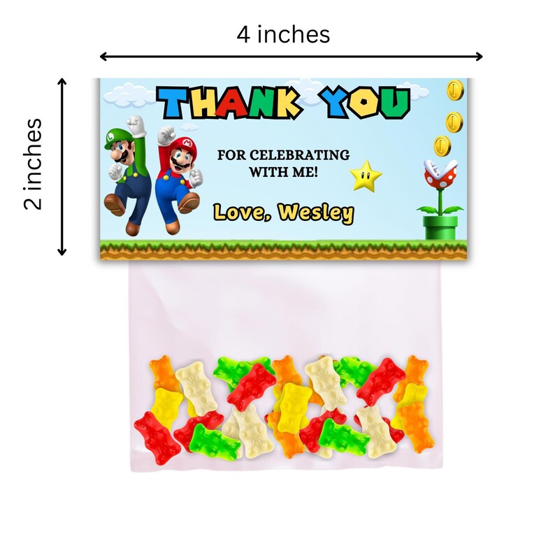 May include: A thank you favor bag with a Mario and Luigi design. The bag is 4 inches wide and 2 inches tall. The bag has a printed label that says "Thank You for celebrating with me! Love, Wesley". The bag is filled with colorful gummy candies.