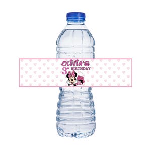 May include: A pink and white water bottle label with a Minnie Mouse design. The label says "Olivia's 3rd Birthday" with pink hearts in the background.