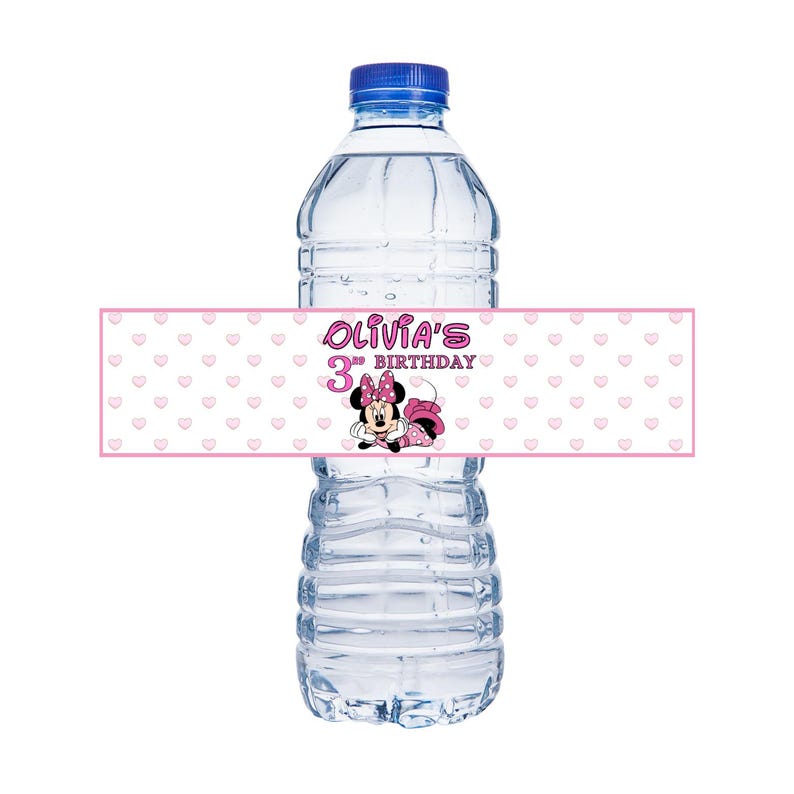 May include: A pink and white water bottle label with a Minnie Mouse design. The label says "Olivia's 3rd Birthday" with pink hearts in the background.