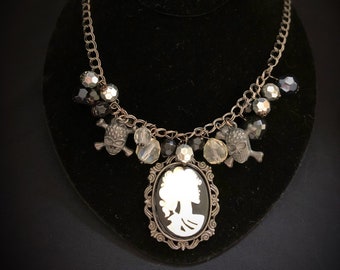 Vintage halloween Goth skull cameo necklace with black / silver beads and 2 skull and crossbones