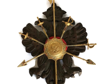 Vintage medieval decor Knight decoration coat of arms insignia on carved wooden plaque with letter opener swords and spears
