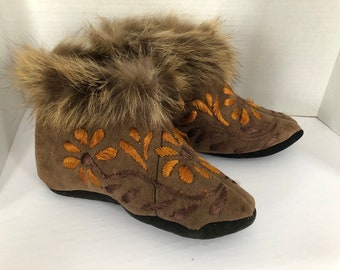 Beautiful handmade Canadian First Nations Indigenous moccasins hand stitched with embroidered flowers and fur trim