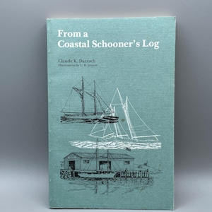 May include: A teal-coloured book titled "From a Coastal Schooner's Log" with illustrations by L. B. Jenson. The cover features white text and drawings of sailing boats and a coastal building.