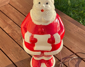 Vintage Santa Claus Blow Mold Red Santa holding his Christmas list