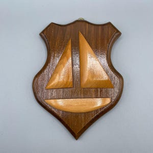 Wooden handcrafted carved folk art sailboat plaque