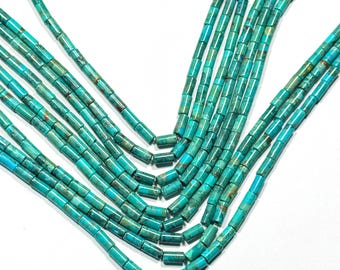 Fio de 38 cm (15") com autênticas contas tubulares de turquesa azul-esverdeada de 4 x 8 mm.