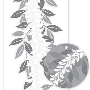 May include: A rectangular tag featuring a vertical white lei pattern against a light gray background, accented by dark gray leaves. A circular cutout is present at the top right, and a circular inset shows a magnified view of the lei and leaf design.
