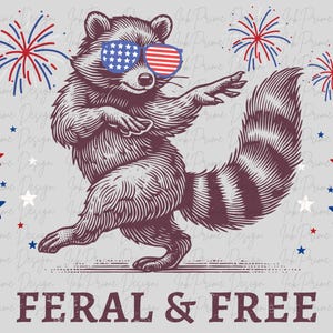 May include: A dancing raccoon illustration wearing American flag sunglasses, with fireworks and stars. The text "FERAL & FREE" is at the bottom. The design is in red, white, blue, and gray.