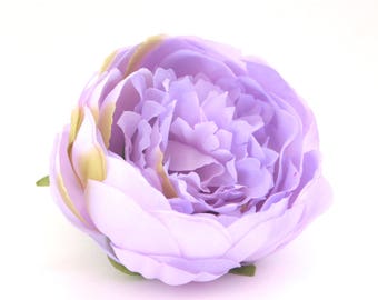 May include: A single, light purple artificial peony flower with a slightly ruffled appearance.