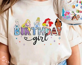 May include: A cream-colored t-shirt featuring a graphic of five animated princesses above the text "BIRTHDAY girl" in black script. The back of the shirt displays the name "Jessica" above a large number three surrounded by colorful gift boxes.