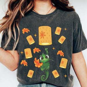 Pascal Floating Lantern Shirt, Rapunzel Chameleon Tee, Magic Kingdom Bound, Epcot Flower Garden Outfit, Tangled Sidekick Graphic Top