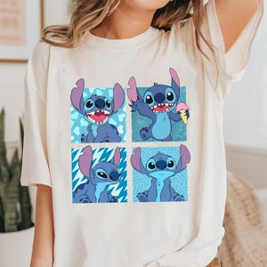 Puede incluir: Una camiseta blanca con un personaje de dibujos animados azul en cuatro poses diferentes. El personaje es Stitch de la pel&iacute;cula de Disney Lilo & Stitch. El fondo de cada pose es un patr&oacute;n azul diferente.