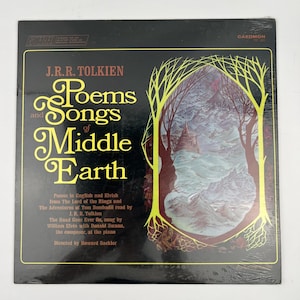 May include: A vinyl record cover titled J.R.R. Tolkien Poems and Songs of Middle Earth. The black cover features yellow text and an oval illustration of a mountain landscape framed by yellow tree silhouettes. Caedmon TC 1231 is printed at the top.