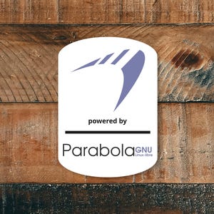 May include: A white logo with a blue abstract design and the text "powered by" above the word "ParabolaGNU Linux-libre" on a wooden background. The logo is centered and the wood has a natural grain.