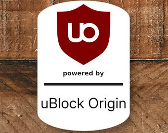 May include: A white and red logo with the text "powered by uBlock Origin" on a wooden background. The logo features a red shield with a white "ub" symbol.
